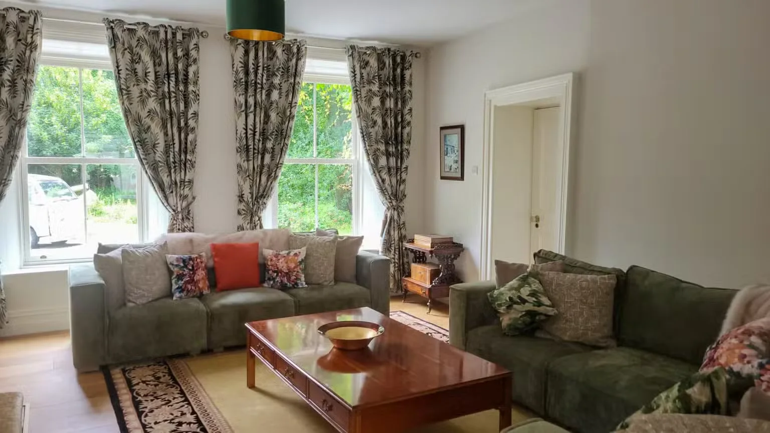 Light-filled sitting room overlooking the gardens at Bettystown House